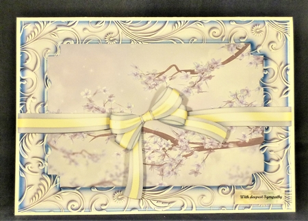 Pale blue blossom framed topper with bow by Michelle Chivers