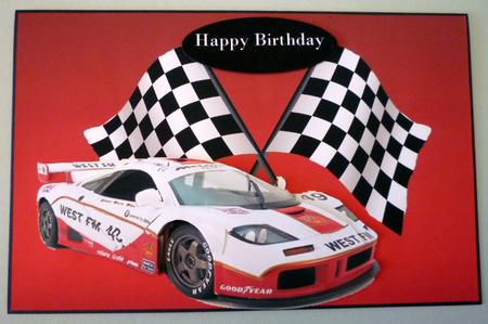 Sport Race Car on Racing Flag Background by Michelle Chivers