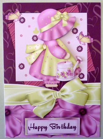 Little Cutie Pie Bonnet Girl with Watering Can and Flowers by Michelle Chivers