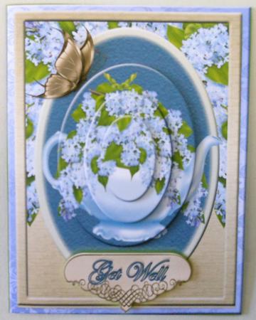 Beautiful Teapot and Iris Flowers with Pyramid Elements by Michelle Chivers