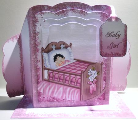 Baby Girl in Cot by Michelle Chivers