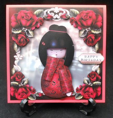 Asian Doll with Red Roses by Michelle Chivers