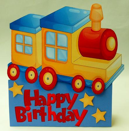 Yellow Toy Train Over the Edge by Michelle Chivers