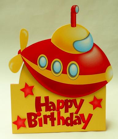 Red & Yellow Toy Boat Over the Edge by Michelle Chivers