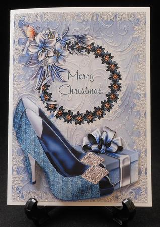 Shoes, Present, Butterfly and Winter Flowers Christmas Card by Michelle Chivers