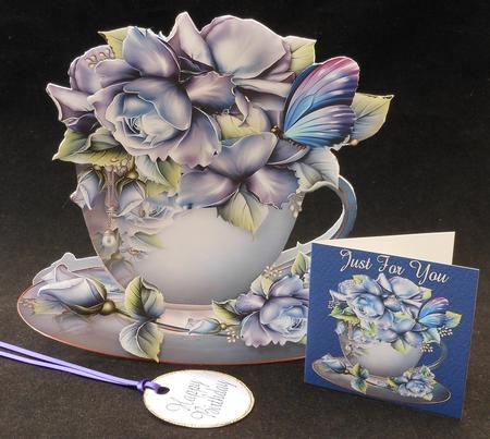 Blue Teacup and Roses by Michelle Chivers