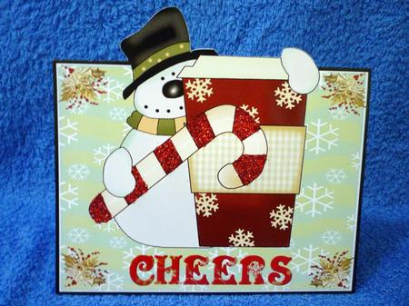 Snowman with Coffee Over the Edge by Michelle Chivers