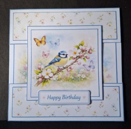 Blue Tit Bird Spring Card Front With Blossoms & Butterflies by Michelle Young
