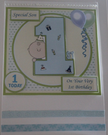 1st Birthday card with large numeral, little boy and balloons by Moira Paterson  (Ornella)