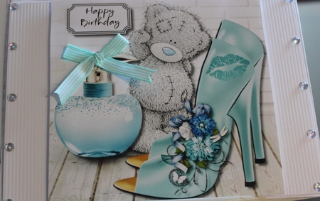 Tatty teddy with shoes and perfume by Moira Paterson  (Ornella)