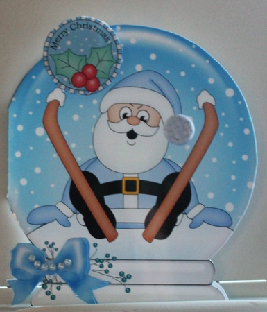 Christmas Snow Globe Shaped Card -  Oops Santa is Skiing by Moira Paterson  (Ornella)