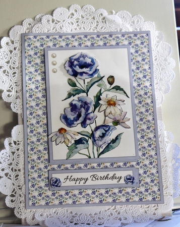 Blue poppies and white daisies step by step topper by Moira Paterson  (Ornella)