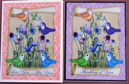 Cute Little Coloured Birdies on a Scroll with Flowers A4 by Nancy Boatwright