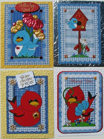 4 Blue Cute Bird Toppers by Nancy Boatwright