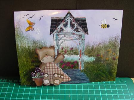 Miss Kitty in Her Garden by Nancy Robinson