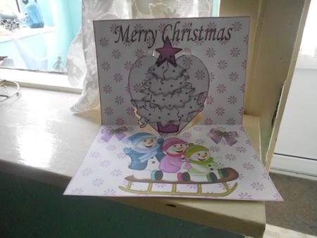 Cute Little Snowmen on a Sledge with Tree Pop Ups by Kay Bowley