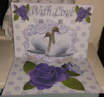 Purple Painted Rose, with White Swans on Pop Up Card by Kay Bowley