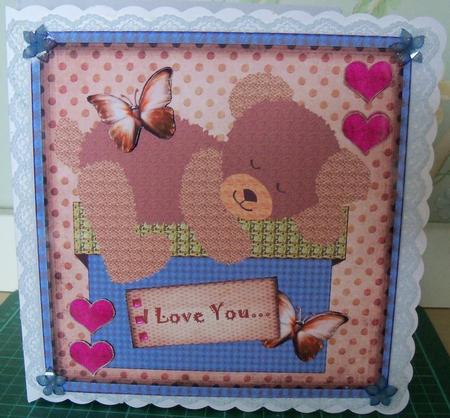 Cute Teddy on Giftbox by Nikki Bevan