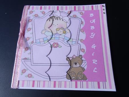 New Baby Girl in Crib by Nicola Buckley-Feiven