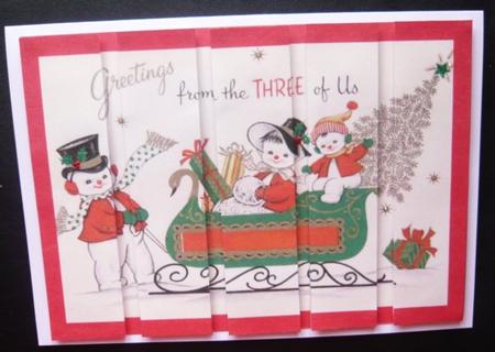 Christmas Greetings from 3 of Us Card Front and Panels by Norma Howgate