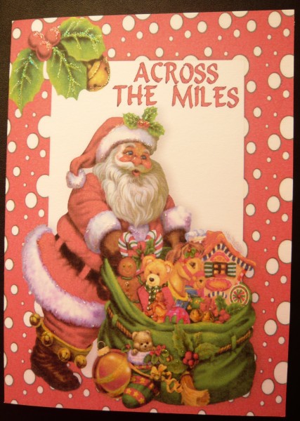 Across the Miles, Santa with Toys A4 by Norma Howgate