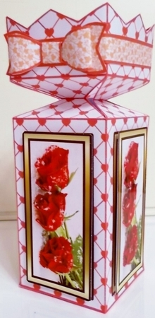 Cracker box Roses in the snow by Pam Stubley