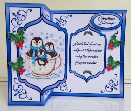 FB Cup full of penguins by Pam Stubley