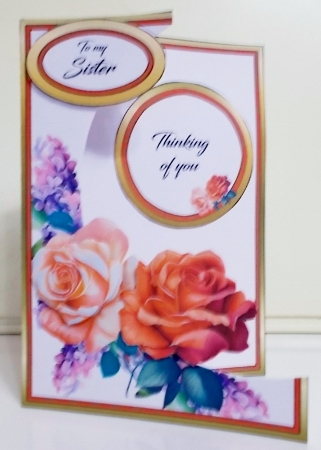 Cutaway Orange roses with lilacs by Pam Stubley