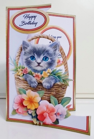 Cutaway Kitty in a basket by Pam Stubley