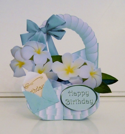 Blue Basket with Frangipanis Cascade Deluxe by Pam Stubley