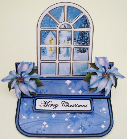 Easel pop-up Christmas window with blue poinsettias by Pam Stubley