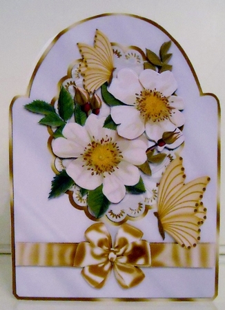 Pretty white flowers in oval lace frame with bow by Pam Stubley
