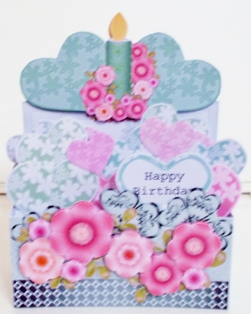Box of flowers with a and a candle and Hearts by Pam Stubley