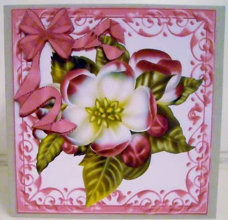 Pretty pink flower in ornate scroll frame with organza bow by Pam Stubley