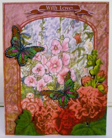 In the garden - with butterfly and hollyhocks decoupage. by Pam Stubley