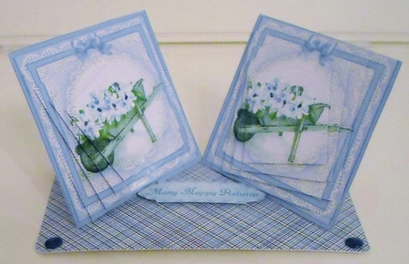 Flower Filled Wheelbarrow Twisted Pyramage sheet by Pam Stubley
