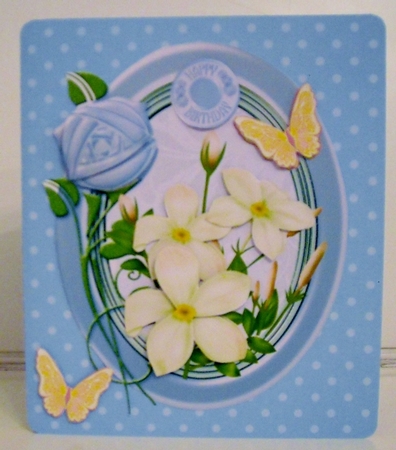 Lilac and cream flowers in oval frame by Pam Stubley