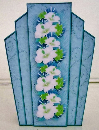 Art deco blue lace frame with a pretty border of spring flowers by Pam Stubley