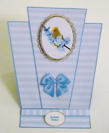 Canary triangle easel card in blue. by Pam Stubley
