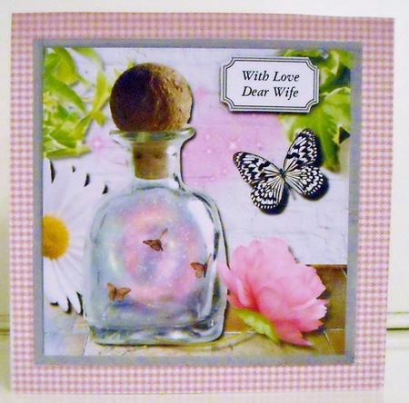 Perfume bottle with flowers by Pam Stubley