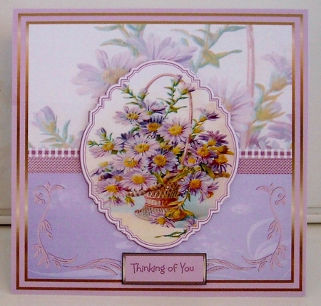 Basket of purple daisy by Pam Stubley