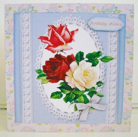 Beautiful White and Red  Roses on Lace  by Pam Stubley