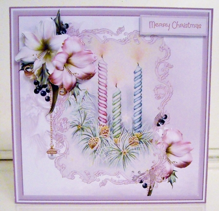Christmas candles and flowers by Pam Stubley