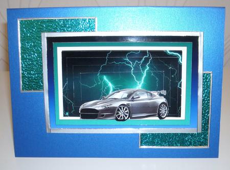 Aston Martin Vanquish Pyramid on Teal Lightning Background by Pam Stubley