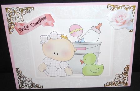 Adorable Baby Girl in a Bucket with Baby Toys by Pam Stubley