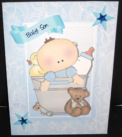 Adorable Baby Boy in a Bucket with Baby Toys by Pam Stubley