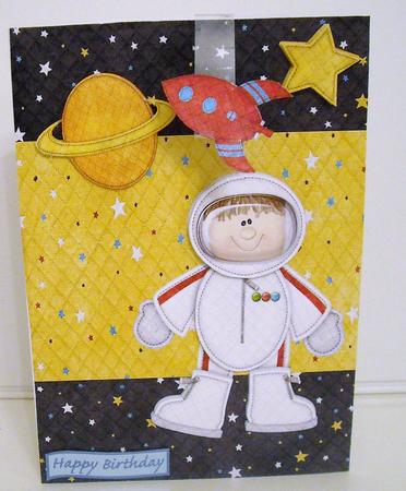 Space Man with Stars & a Planet by Pam Stubley