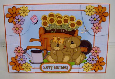 Sunflowers in a Wheelbarrow by Pam Stubley
