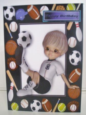 Boy Having a Kick About in Sports Frame by Pam Stubley