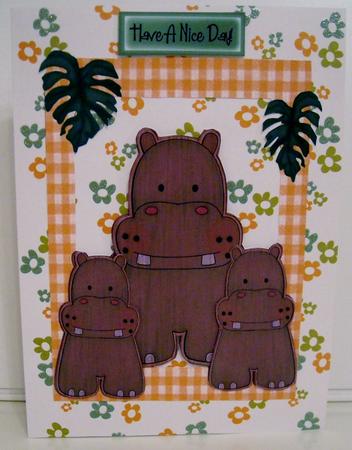 Wooden Hippo with Her Babies in Scalloped Frame by Pam Stubley